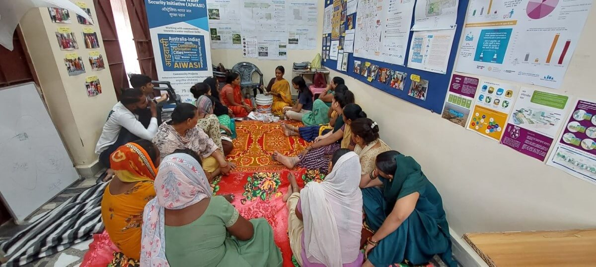 Discussion with residents of the Bakkarwala Resettlement Colony in Delhi to understand their challenges and need for improved water access and public spaces.