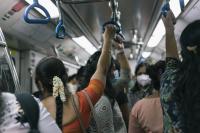 Woman in a crowded metro