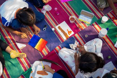 Children paint their idea of a BluGreenUru