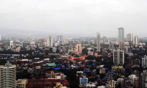The island city's skyline is dotted with a plethora of building types and the railway line serves as its backbone. Photo by Rejeet Mathews