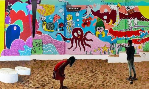 Caregivers resting while their children play in the family-friendly public space along Poovath Street. Photo by Visakha KA/WRI India.