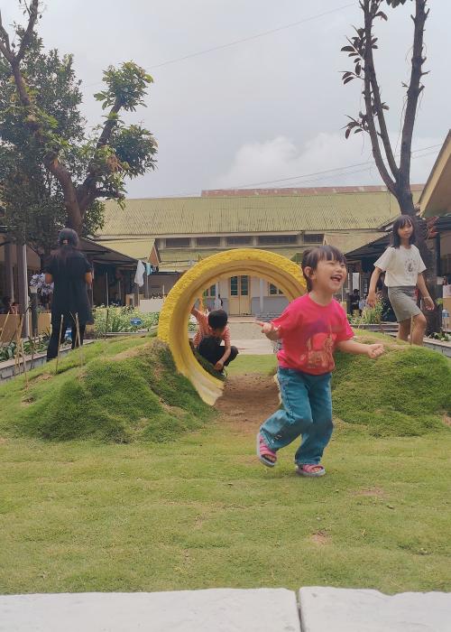 A kid playing in a park
